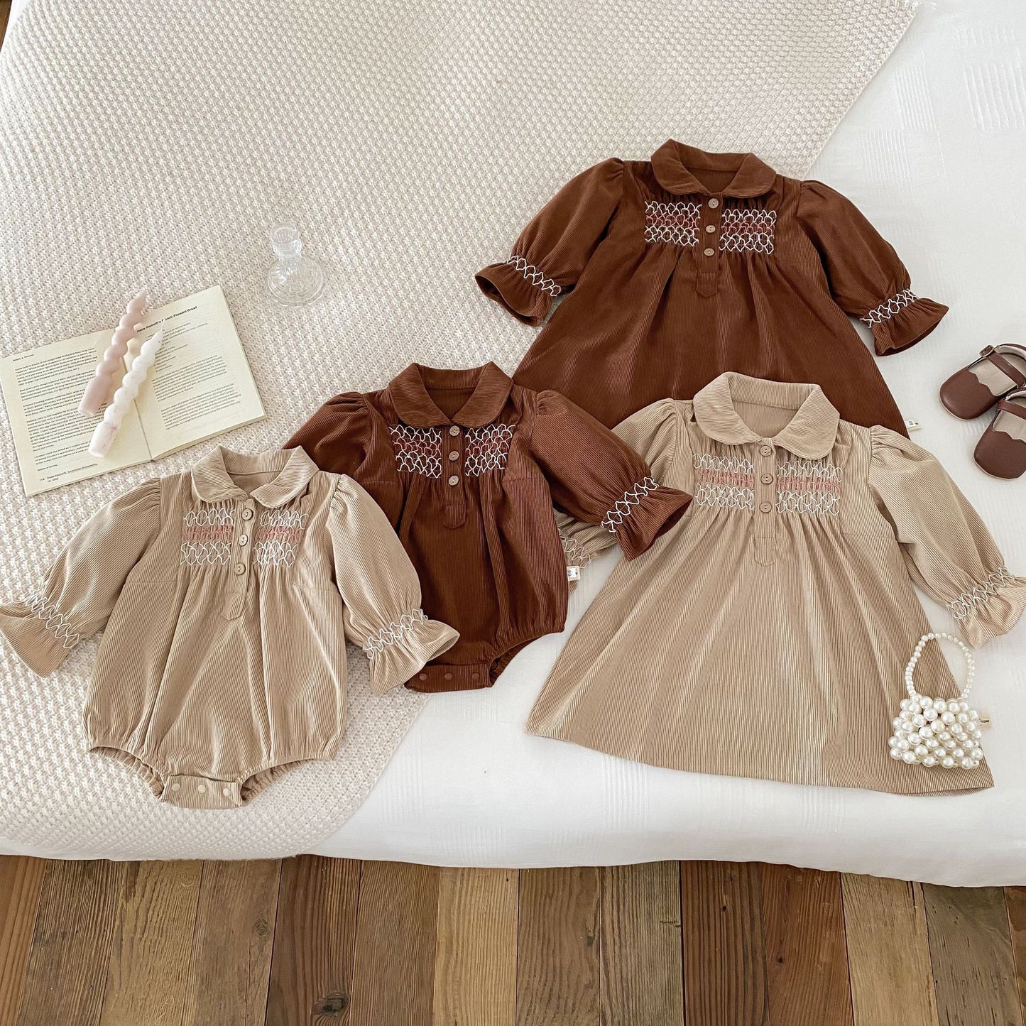 Acorn Smocked Dress family, styled flat lay