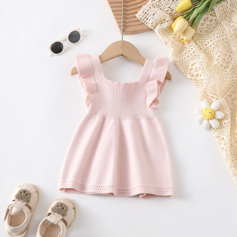 Petal Knit Pinafore styled on hanger