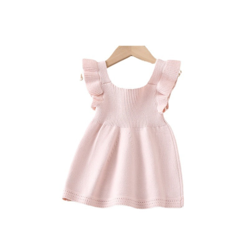 Petal Knit Pinafore in muted pink, flat lay