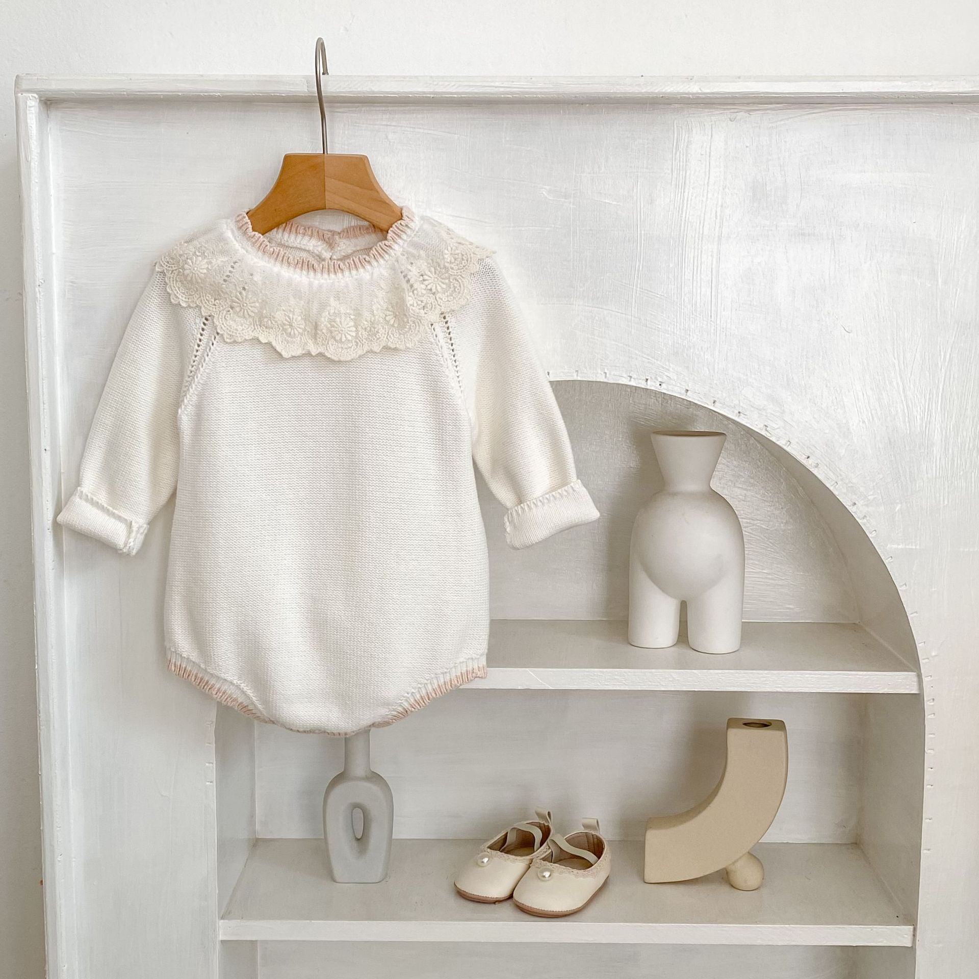 Meadow Lace Romper on shelf