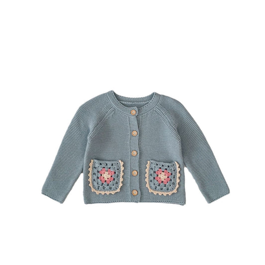 Petal Acorn Cardigan - sage blue knit with crochet flower pockets, flat lay