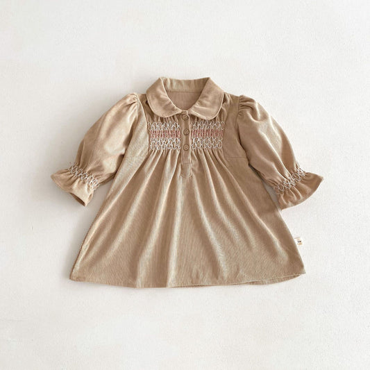 Acorn Smocked Dress in Oat corduroy, flat lay
