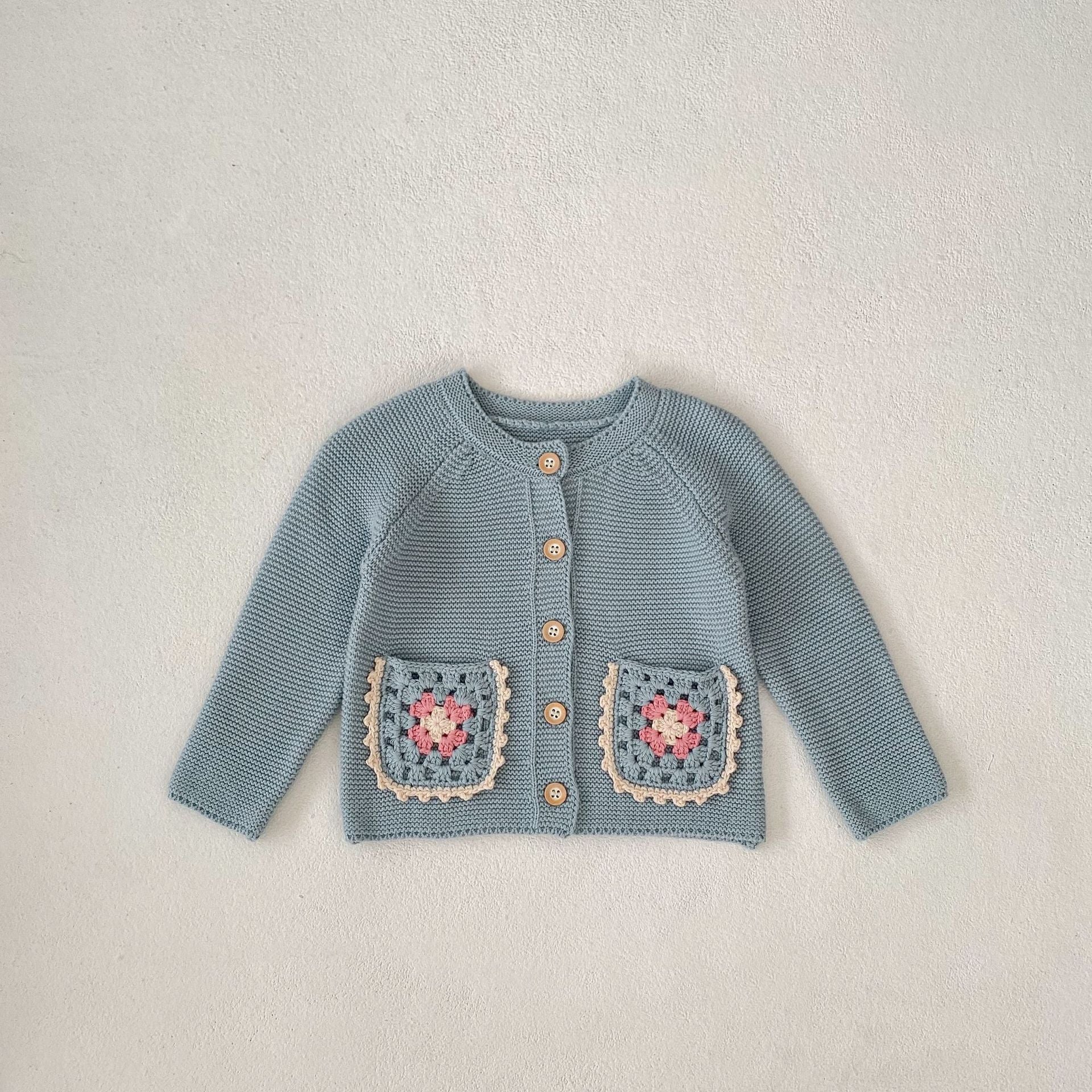 Petal Acorn Cardigan flat lay front view