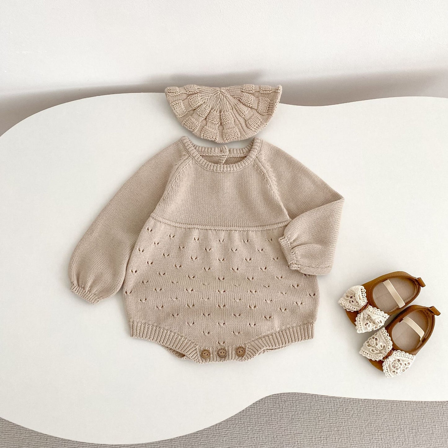 Acorn Pointelle Romper on baby
