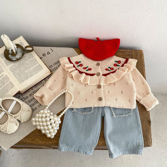 Fern Cropped Denim light wash flat lay